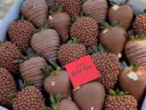 Delicious strawberry’s cover up with chocolates