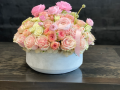 Round concrete vase with pink mix