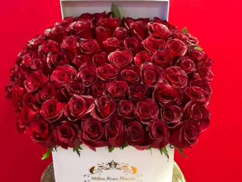 RED ROSES IN A WHITE SQUARE BOX