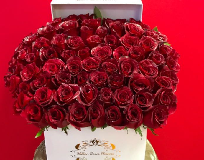 RED ROSES IN A WHITE SQUARE BOX